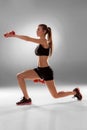 Sporty woman doing aerobic exercise