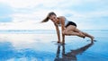 Sporty woman doing mountain climber exercise - run in plank position Royalty Free Stock Photo