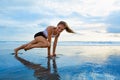 Sporty woman doing mountain climber exercise - run in plank position Royalty Free Stock Photo