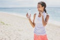 sporty woman drinking mineral water after workout for refreshment Royalty Free Stock Photo