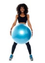 Sporty woman holding pilate ball Royalty Free Stock Photo