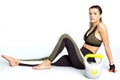 Fit young woman during a break after workout with kettlebell. Image Royalty Free Stock Photo