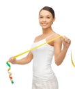 Sporty woman with measuring tape Royalty Free Stock Photo
