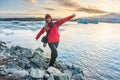 Sporty woman near Ice Glacier Jokulsarlon Lagoon, Iceland Royalty Free Stock Photo