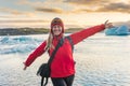 Sporty woman near Ice Glacier Jokulsarlon Lagoon, Iceland Royalty Free Stock Photo