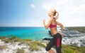 Sporty woman running or jumping Royalty Free Stock Photo