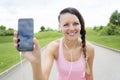 Sporty woman running outdoors in park Royalty Free Stock Photo