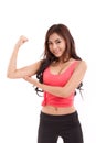 Sporty woman showing, checking her biceps arm muscle Royalty Free Stock Photo