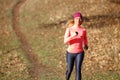 Sporty woman in sportswear jogging in park Royalty Free Stock Photo