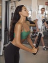 Sporty Woman Training in the Gym Indoors Royalty Free Stock Photo