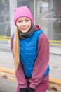 Sporty woman waiting for bus