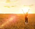 Sporty woman in wheat field Royalty Free Stock Photo