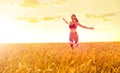 Sporty woman in wheat field Royalty Free Stock Photo