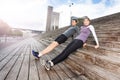 Sporty young couple exercising together outdoors Royalty Free Stock Photo