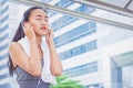 Sporty young fitness girl running and listening music in the cit Royalty Free Stock Photo