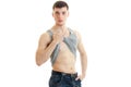 Sporty young guy looking forward raises the hand Mike and shows body Royalty Free Stock Photo