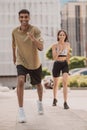 Sporty young man and a girl performing an aerobic exercise Royalty Free Stock Photo