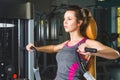 Sporty young woman doing exercise at the gym Royalty Free Stock Photo