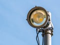 Spot light or bulb light against clear blue sky. Led lamp with directional light
