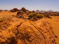 spot in Tenerife with many red rocks and beautiful mountain landscape background Royalty Free Stock Photo