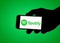 Spotify logo on mobile device