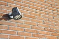 Spotlight against a new brick wall - image with copy space Royalty Free Stock Photo