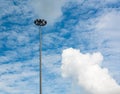 Spotlight or electric pole, Blue sky background Royalty Free Stock Photo