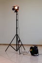 Spotlight with halogen bulb and Fresnel lens. Lighting equipment for Studio photography or videography