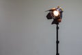 Spotlight with halogen bulb and Fresnel lens. Lighting equipment for Studio photography or videography Royalty Free Stock Photo