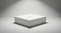 Spotlight illuminates a simple white cube on a clean minimalist background Royalty Free Stock Photo