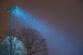 Spotlight and night snowfall Royalty Free Stock Photo