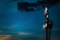 Spotlight pole tower at night of football or soccer stadium. Royalty Free Stock Photo