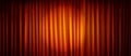 Spotlight on red curtain with golden sparkles Royalty Free Stock Photo