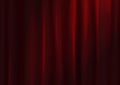 Spotlight on red velvet stage curtain. Royalty Free Stock Photo