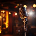 Spotlight on a retro microphone, stage with bokeh, music concept Royalty Free Stock Photo