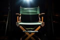 spotlight shining on directors chair Royalty Free Stock Photo