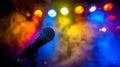 Spotlight On Stage Microphone With Colorful Lights And Smoke Effect Royalty Free Stock Photo