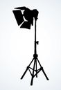 Spotlight on a stand. Vector drawing Royalty Free Stock Photo