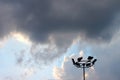 Spotlight tower against rainy cloud Royalty Free Stock Photo