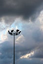 Spotlight tower against rainy cloud Royalty Free Stock Photo