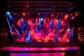 Spotlights and equipment on a large professional stage, smoke-filled stage effect