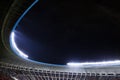 Spotlights and floodlights at a stadium at night Royalty Free Stock Photo