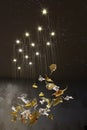 Spotlights illuminated interior chandelier made of golden and transparent Swarovski crystals shaped like a leaves