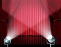 Spotlights on red velvet cinema curtains Royalty Free Stock Photo