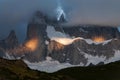 Spots of light on the mountain in the cloud.