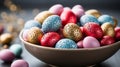 Spotted Easter colored eggs in a ceramic bowl on the kitchen table Royalty Free Stock Photo