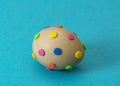Spotted Easter egg. Multi-colored spots are made of foamiran. Manual labor Royalty Free Stock Photo
