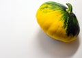 Spotted patty squash on a white background.