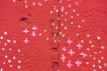 Spotted red painted rough plaster wall surface. abstract background Royalty Free Stock Photo