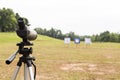 Spotting scope on tripod at outdoor archery target range Royalty Free Stock Photo